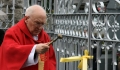 Fr. Whelan blessing the gates